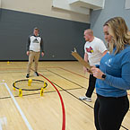 Students gather around to play game