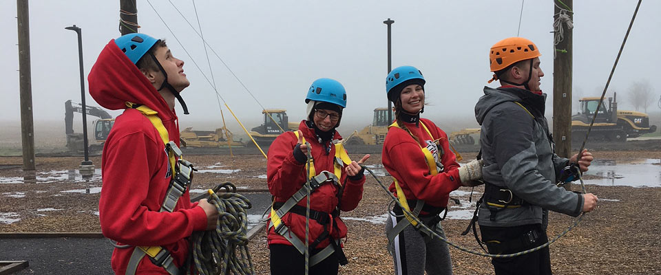 Students outside rappelling